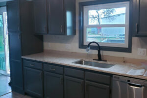 Laura in Pleasantville Dark Colored Cabinets